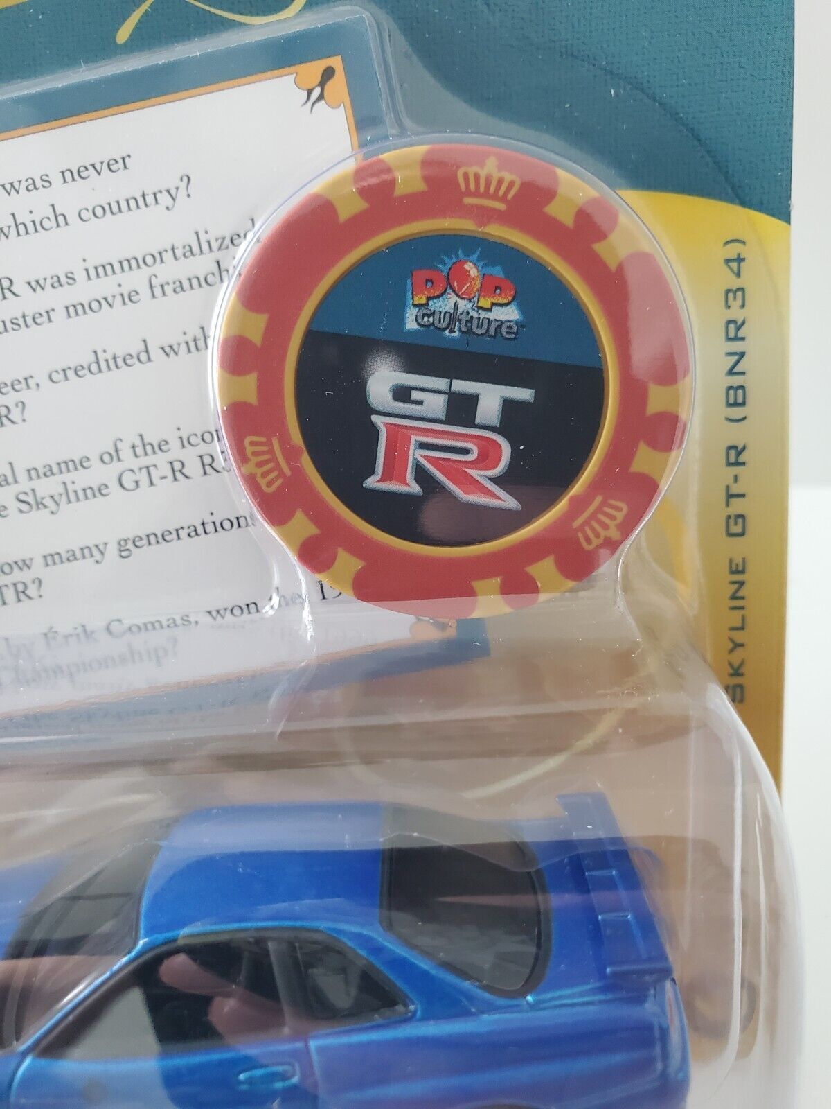 2022 Johnny Lightning Trivial Pursuit 1999 Nissan Skyline GT-R (BNR34)