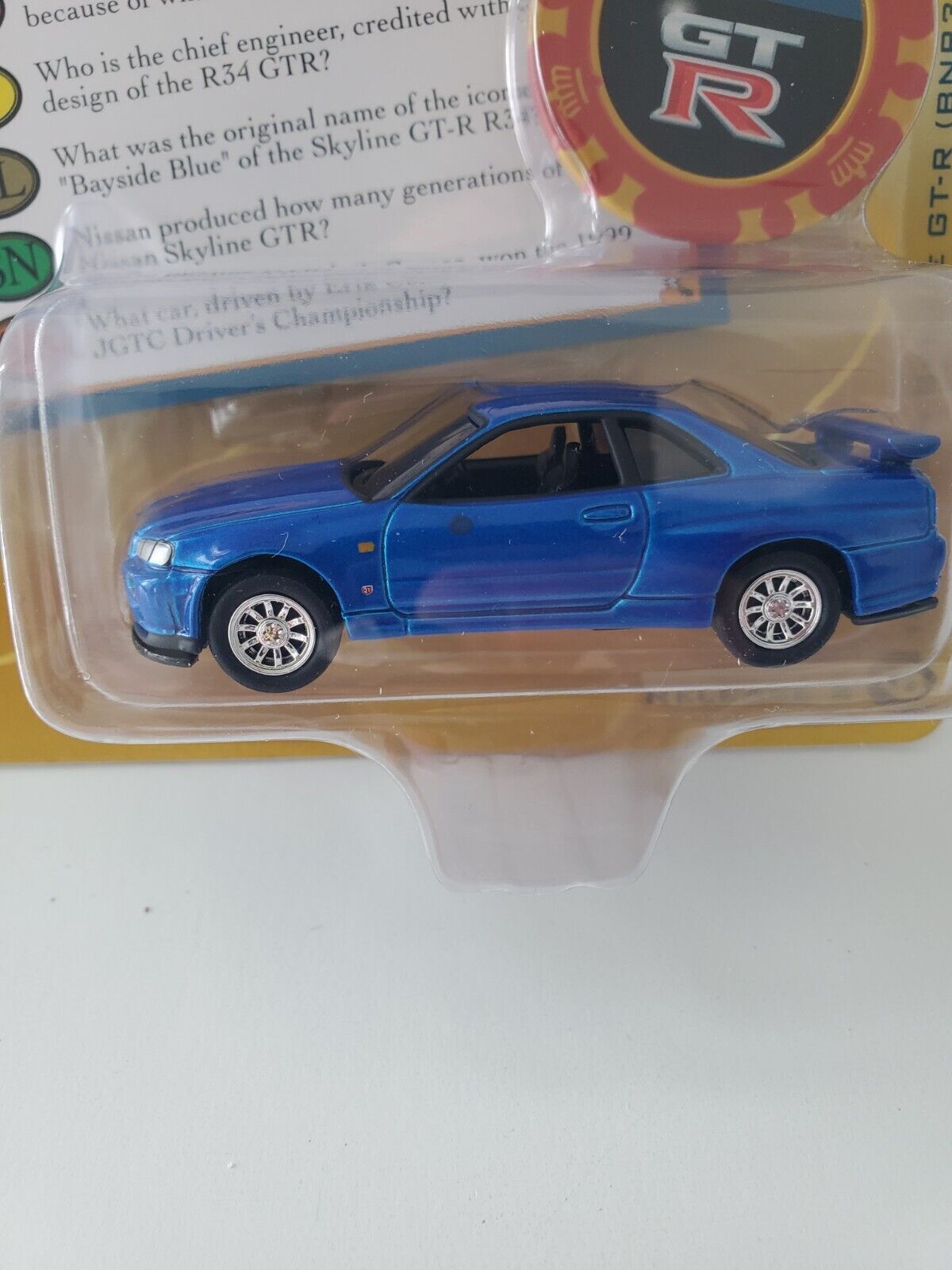 2022 Johnny Lightning Trivial Pursuit 1999 Nissan Skyline GT-R (BNR34)