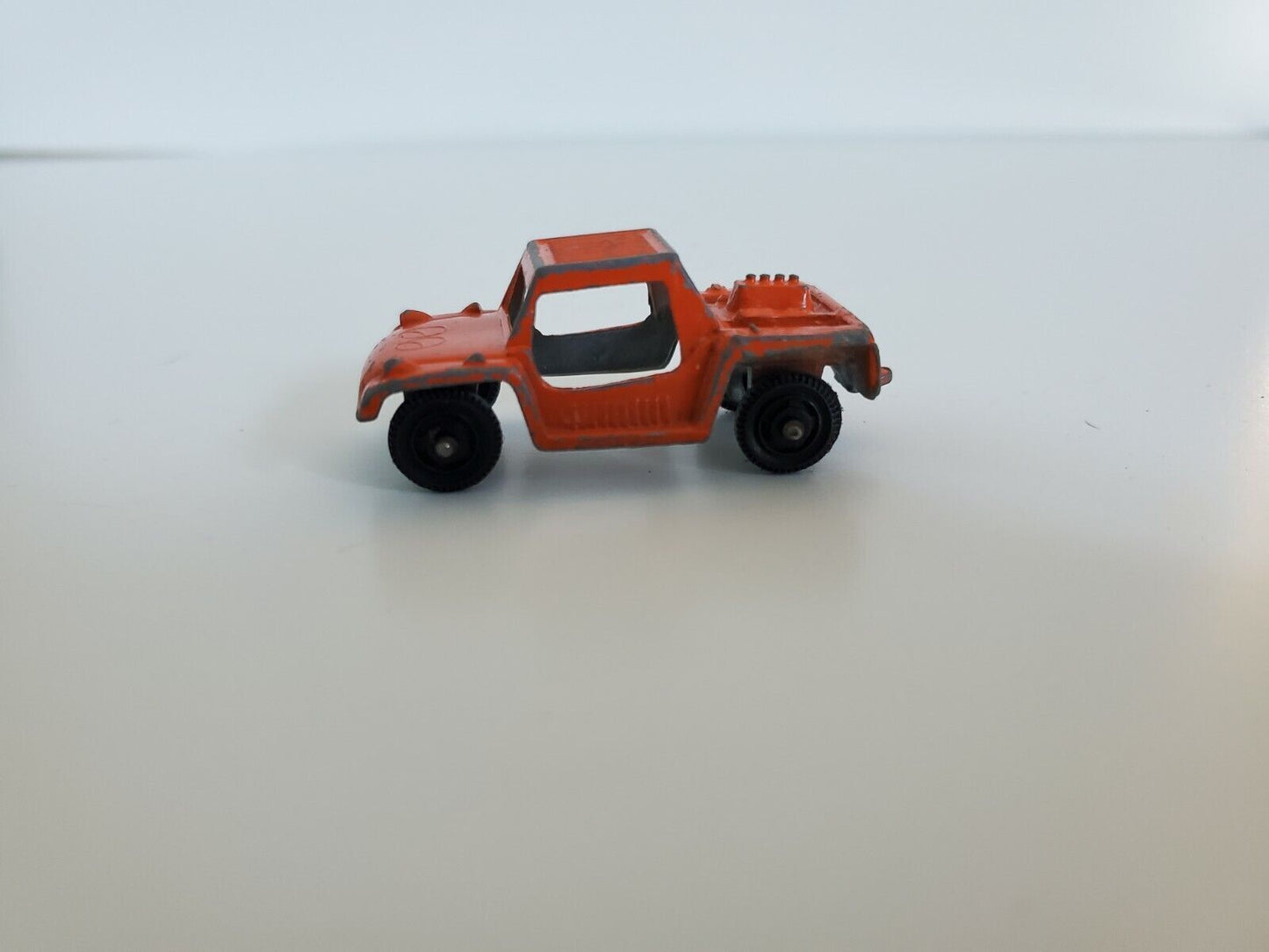 Tootsie Toy "Orange Baja Runabout" Made USA  2" Long