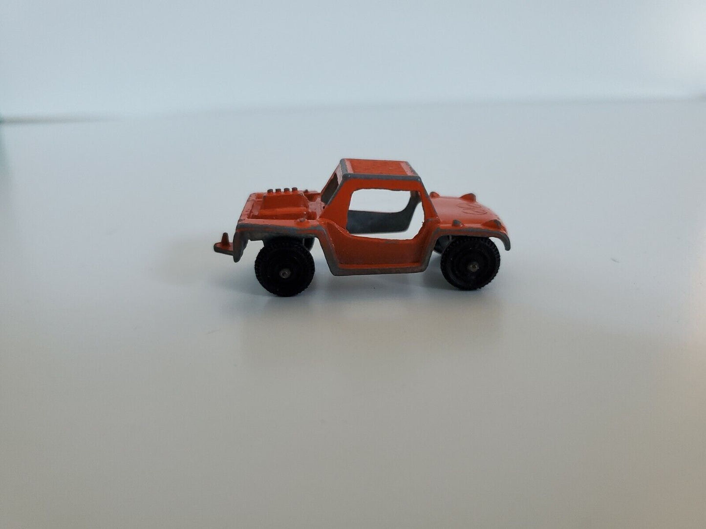 Tootsie Toy "Orange Baja Runabout" Made USA  2" Long